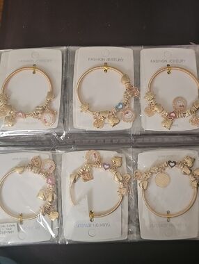 Hello Kitty Gold Charm Bracelet with Pink, Blue and Purple Accents